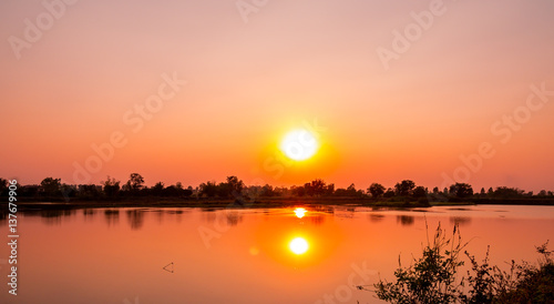 Beautiful landscape sunset at the river in the evening. © ETAP
