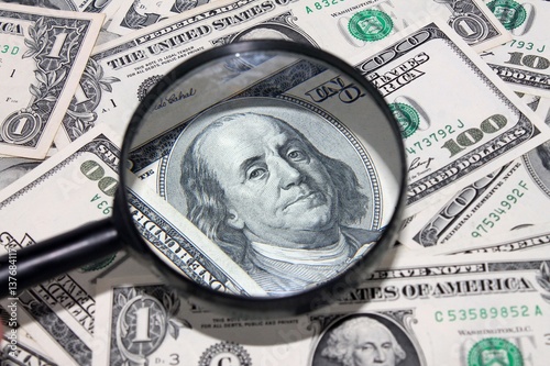 american 100 dollars bills money under manifying glass