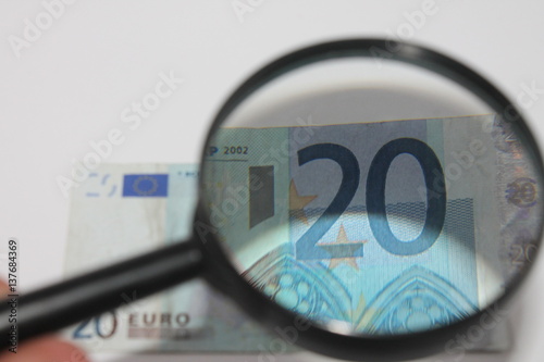 euros under magnifying glass