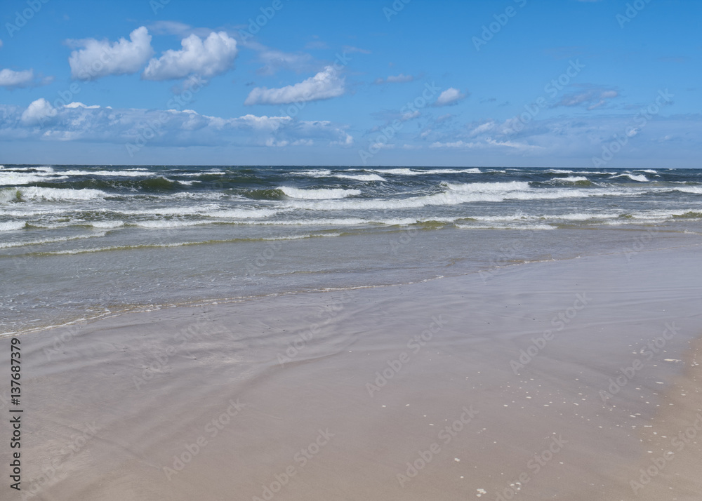 Baltic Sea - water waves. Beautiful blue sky and turbulent sea.