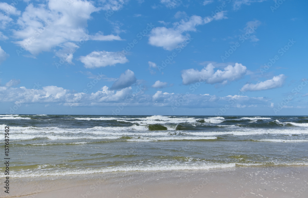 Baltic Sea - water waves. Beautiful blue sky and turbulent sea.