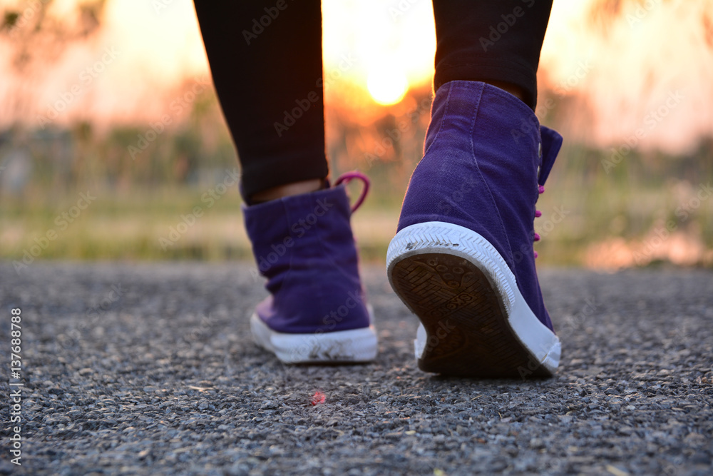 People walking at the morning for warm up body for jogging and exercise People walking at the morning for warm up body for jogging and exercise