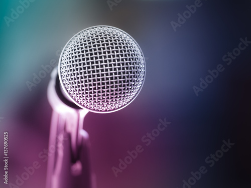 Color filter/ Close up of microphone in karaoke room or conference room. With place your text on background