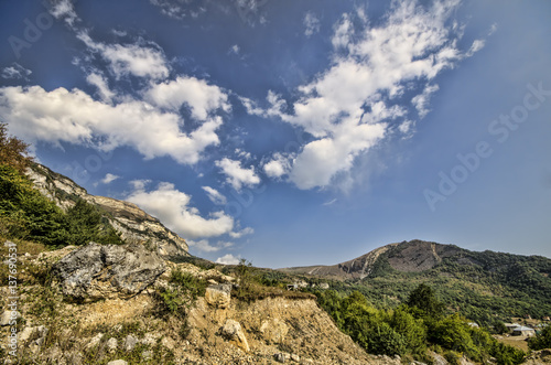 Rocky Mountains Landscape with sunny sky with clouds. Beautiful Caucasus nature. Azerbaijan Guba
