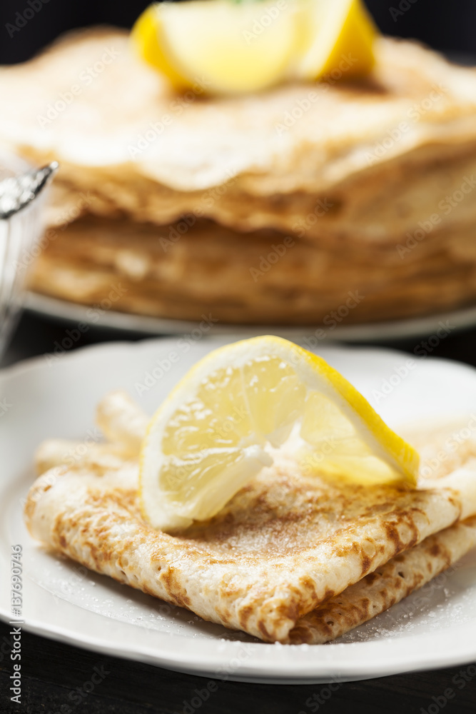English-style pancakes with lemon and sugar, traditional for Shrove Tuesday
English-style pancakes with lemon and sugar, traditional for Shrove Tuesday