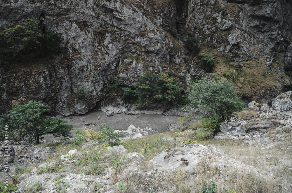 The big mountain river flows down on big stones. Big Caucasus Azerbaijan nature