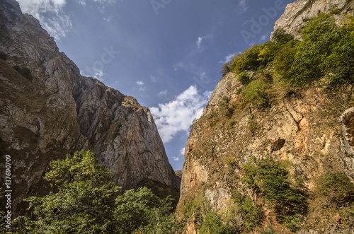 Rocky Mountains Landscape with sunny sky with clouds. Beautiful Caucasus nature. Azerbaijan Guba