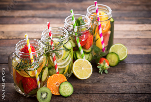 Принти на полотні Fresh detox water with fresh fruits, vegetables and herbs