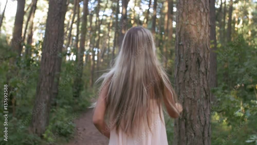 Girl runs through a thicket Girl runs through a thicket