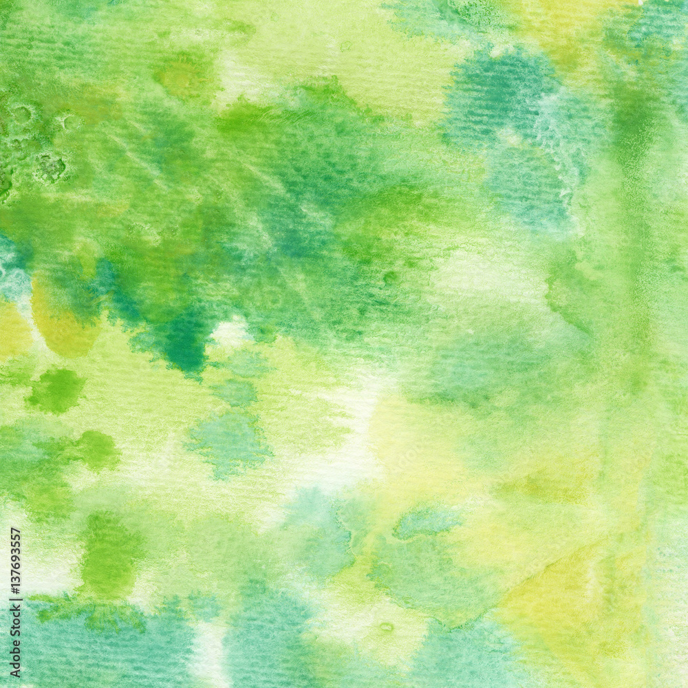 Abstract hand painted watercolor background on textured paper in green shades