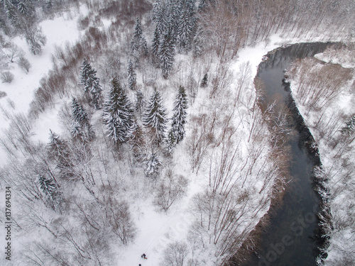 winter landscape photographed from above the forest and river