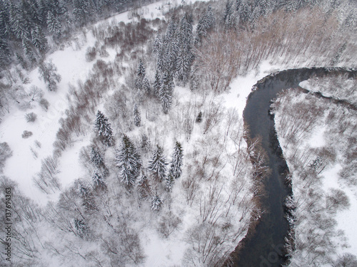 winter landscape photographed from above the forest and river