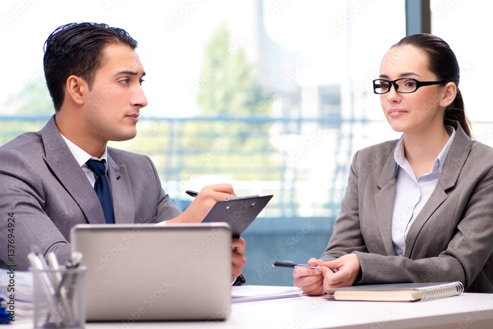 Businesspeople having discussion in the office Businesspeople having discussion in the office