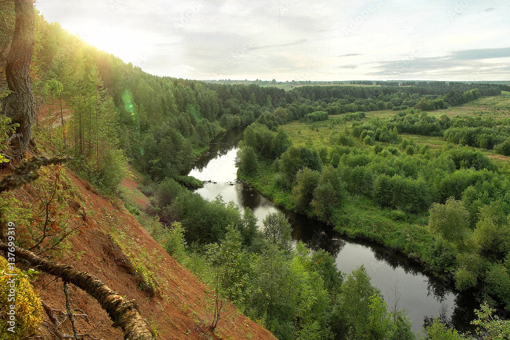 Picturesque view of river Uftyuga sunset steep high coast