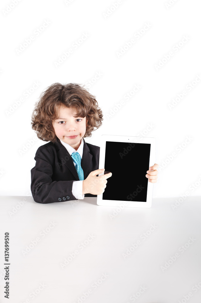 Little curly-haired businessman sitting half-turned, points a finger at the tablet. Close-up. White background. Little curly-haired businessman sitting half-turned, points a finger at the tablet. Close-up. White background.