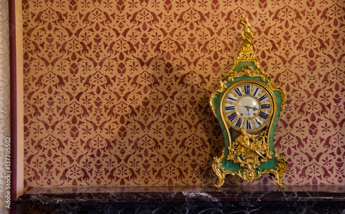 Vintage table clock in a room