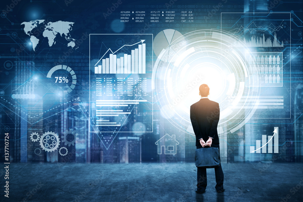 Businessman looking at graph on virtual screen Businessman looking at graph on virtual screen