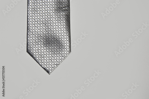 Man`s fashion.  The Fifty Shades of Gray Theme. Gray background. Free place for text. The Fifty shades darker.  Part of suit. Elegant fashion. Elegant man.