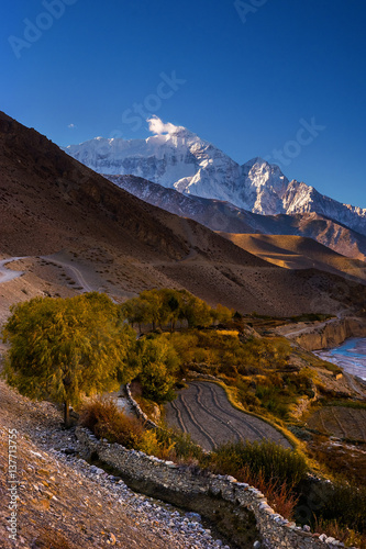 The Annapurna circuit trek in the Nepal Himalaya. The Kali Gangaki river valley near Village of Kagbeni. photo