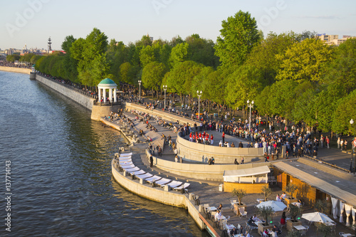 People walking on embankment of the Moscow river