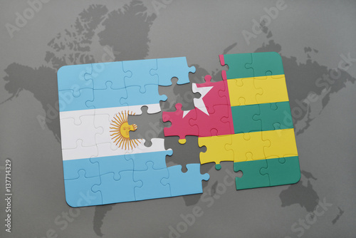 puzzle with the national flag of argentina and togo on a world map