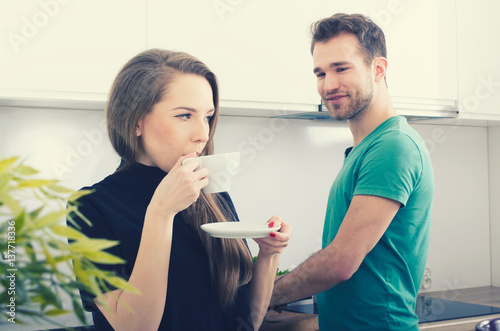Young couple spends time together in the kitchen