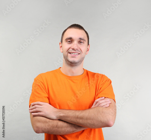 Confident man with crossed ...