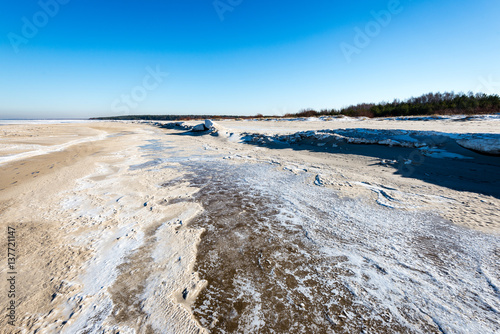 frozen beach in cold winters day