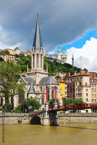 St. Georges church and bridge over Saone river in Lyon, France