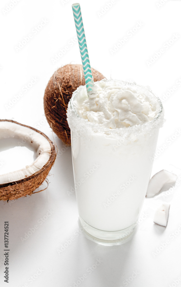 cocktail with coconut on white background cocktail with coconut on white background