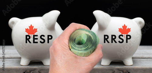 Financial concept depicting the choice between investing in RESP or RRSP for Canadian photo