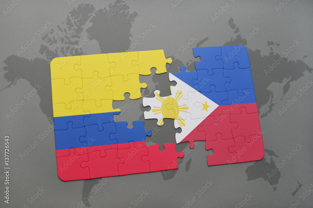 puzzle with the national flag of colombia and philippines on a world ...