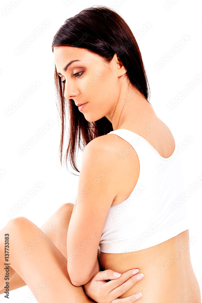 Portrait of beautiful fit girl in bra. Isolated on white. Portrait of beautiful fit girl in bra. Isolated on white.