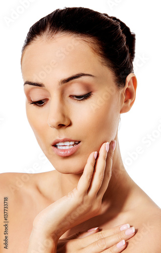 Beautiful face of young woman with clean fresh skin.