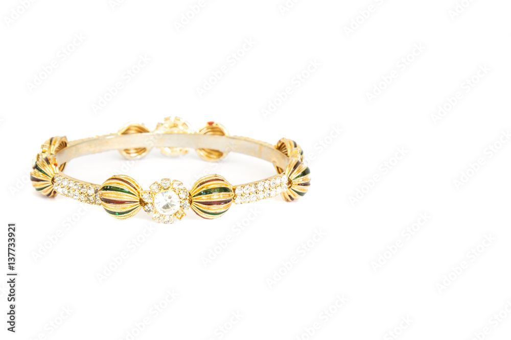 Gold bracelets with gem and diamonds isolate on white background. Gold bracelets with gem and diamonds isolate on white background.