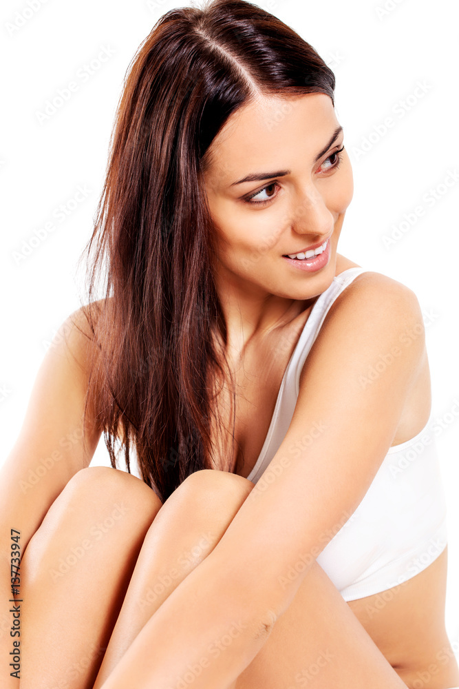 Portrait of beautiful fit girl in bra. Isolated on white. Portrait of beautiful fit girl in bra. Isolated on white.