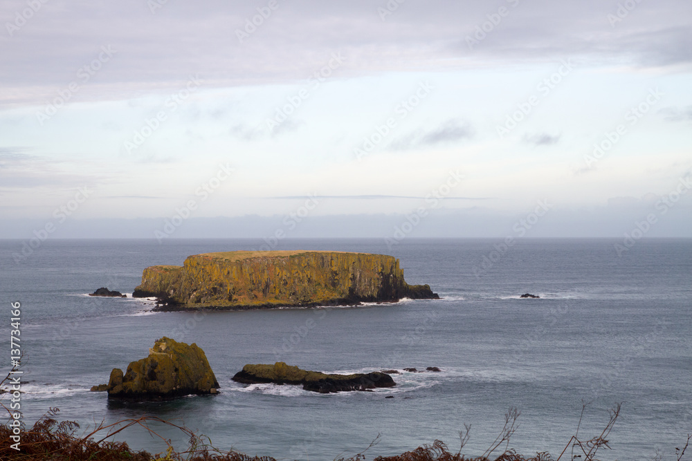 Carrick-a-Rede Rope Bridge, near Ballintoy in County Antrim, Northern Ireland, believed to been built by salmon fishermen to the island for over 350 years