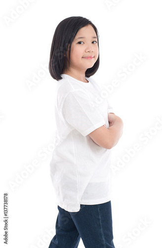 Cute Asian girl in white t-shirt and jeans standing on white background isolated © lalalululala