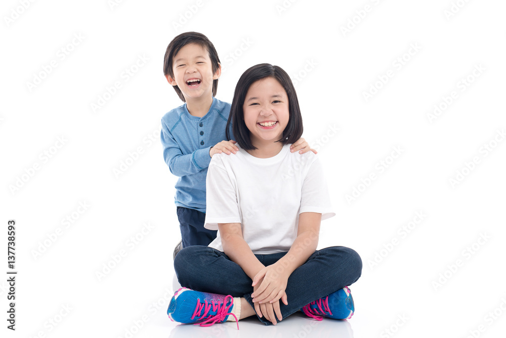 asian children sitting on white background asian children sitting on white background