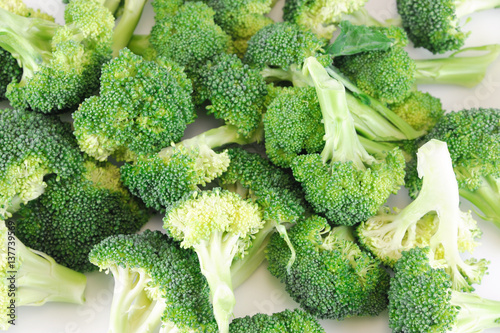 fresh chopped broccoli isolated on white background
