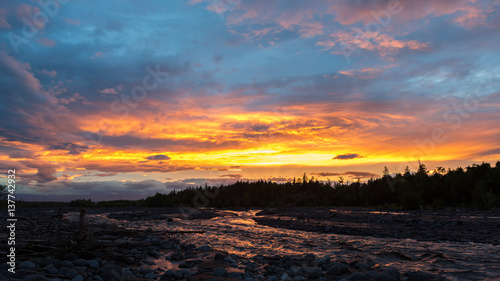 Beautiful sunset on river Studenaya. Kamchatka Peninsula.