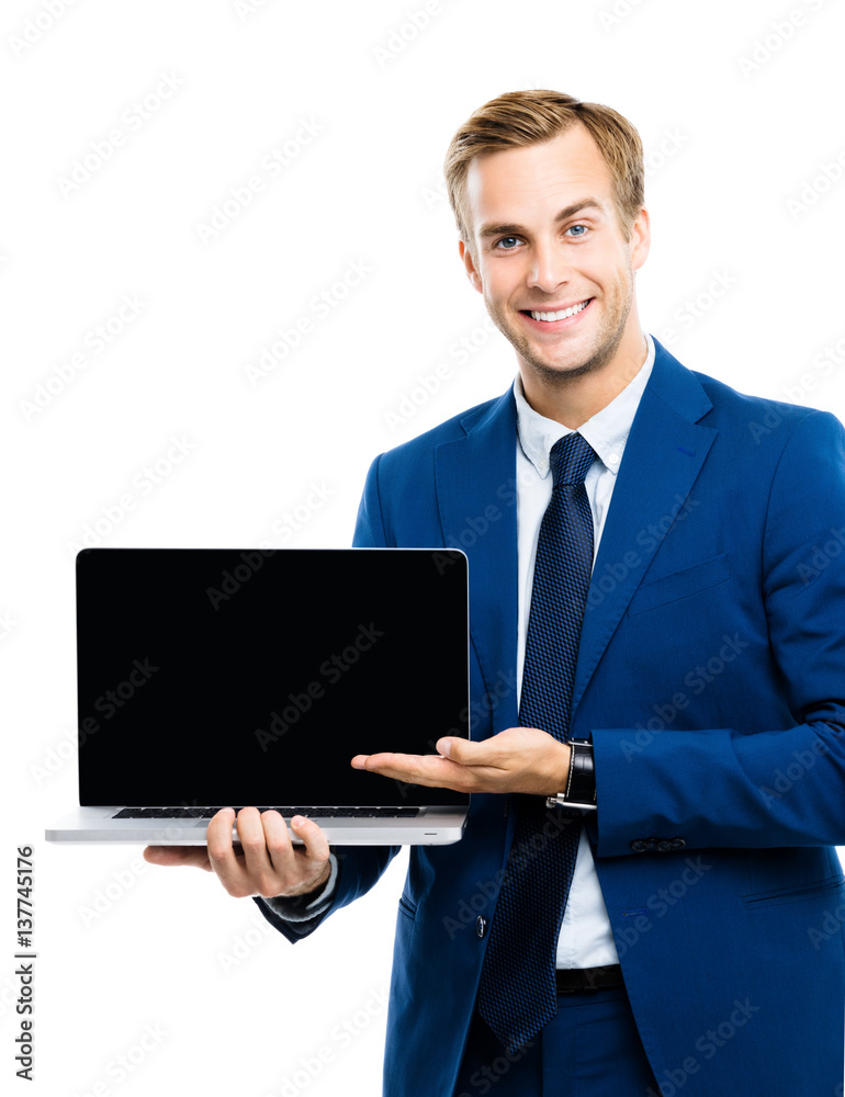 Businessman showing blank laptop Businessman showing blank laptop