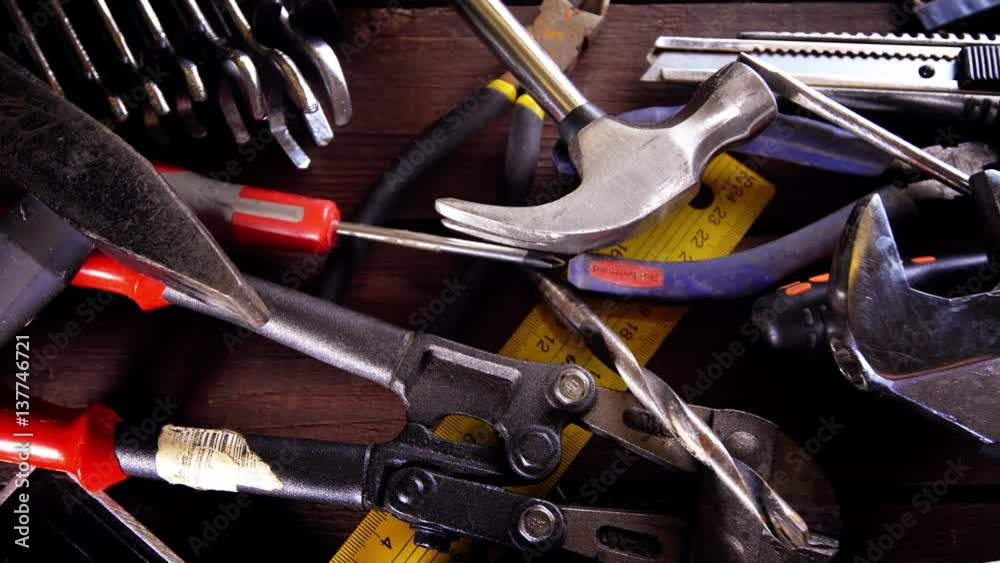 Many old rusty tools on repairman desk