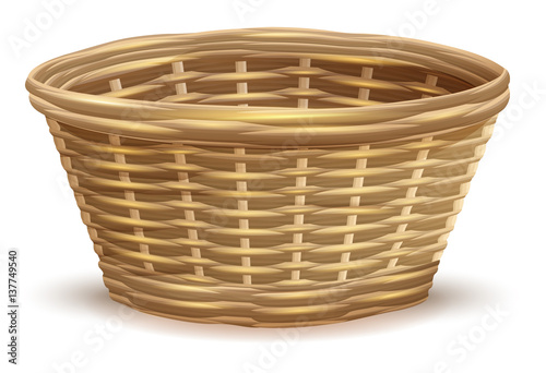 Empty wicker basket without handles photo