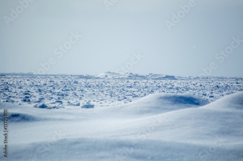 Lake huron icebergs and snow dunes landscape © claire