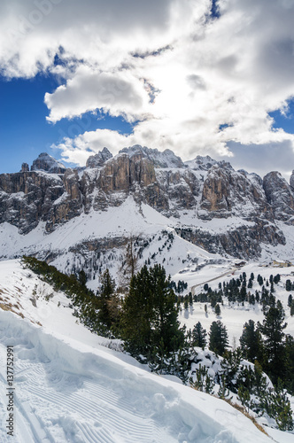 Cloudy view of snow valley near Canazei of Val di Fassa, Trentino-Alto-Adige region, Italy. © Neonyn