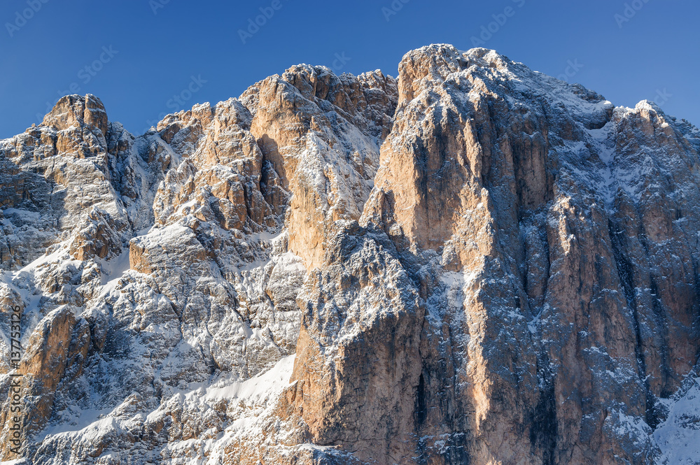 Sunny view of Dolomite Alps near Canazei of Val di Fassa, Trentino-Alto-Adige region, Italy.