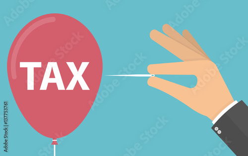 Tax concept. Hand pricking tax balloon with needle