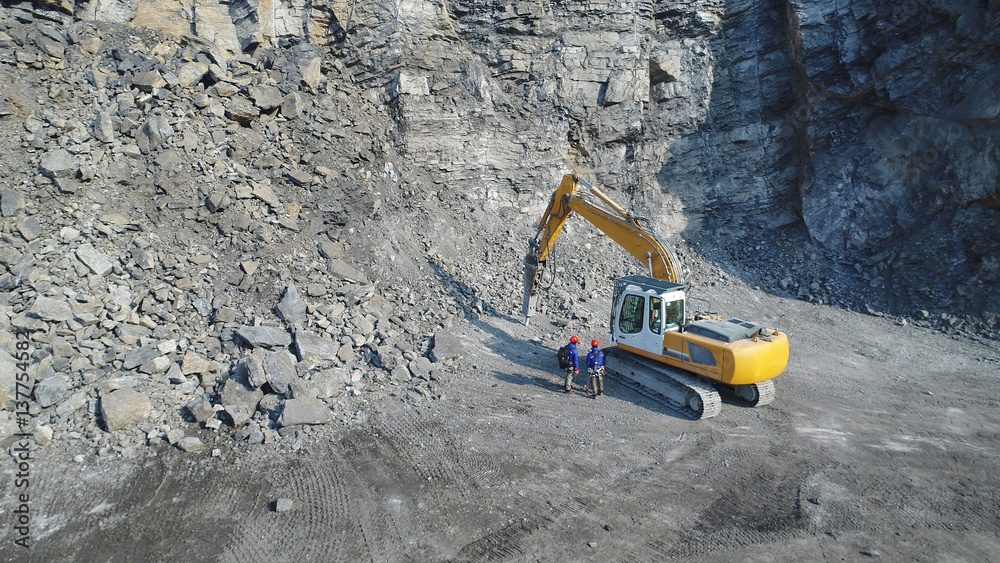 Working in Gravel pit with excavator Working in Gravel pit with excavator