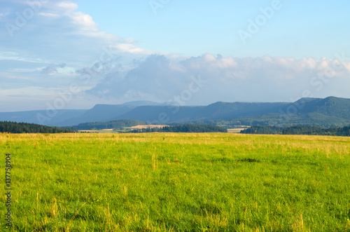 Landscape with meadows and hills © CCat82